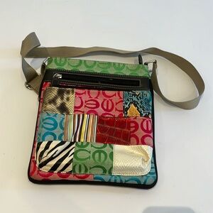 Multi-print and mixed media cross body bag